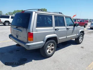 2001 Jeep Cherokee Sport with VIN 1J4FF48SX1L568532, listed as a IAAI auction lot 42738398 with 281,001 mi miles and . Bid and sale history available at DreamBid. Image 4.