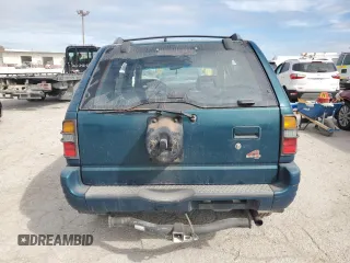 1998 Isuzu Rodeo S with VIN 4S2CM58W8W4368553, listed as a Copart auction lot 71313904 with 183,059 mi miles and Salvage title. Bid and sale history available at DreamBid. Image 6.