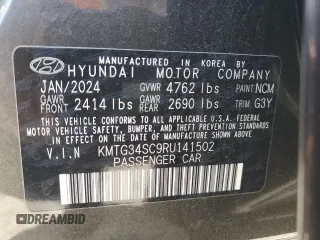 2024 Genesis G70 2.5T with VIN KMTG34SC9RU141502, listed as a Copart auction lot 50356715 with 2,595 mi miles and Salvage Title. Bid and sale history available at carsss.com. Image 14.