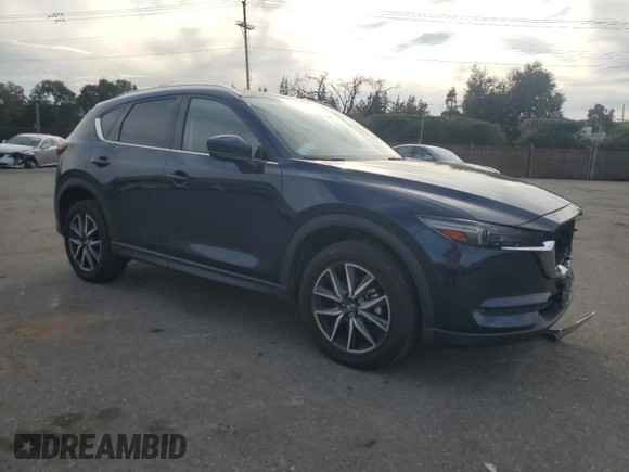 2018 Mazda CX-5 Grand Touring with VIN JM3KFADM7J0380568, listed as a Copart auction lot 48749015 with 53,401 mi miles and Salvage Title. Bid and sale history available at carsss.com. Image 4.