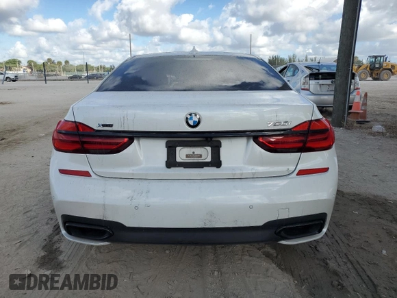 2016 BMW 7 Series 750i xDrive with VIN WBA7F2C59GG415722, listed as a Copart auction lot 75942273 with 0 mi miles. Bid and sale history available at carsss.com. Image 6.