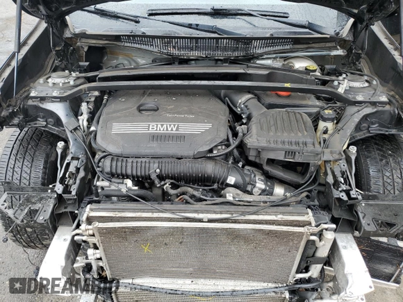 2021 BMW X1 xDrive28i z VIN WBXJG9C06M5T76049, wystawiony jako Copart lot #51816115 z przebiegiem 59 656 mil mil oraz Szkoda całkowita • Salvage title. Historia ofert i sprzedaży dostępna na DreamBid. Obrazek 13.