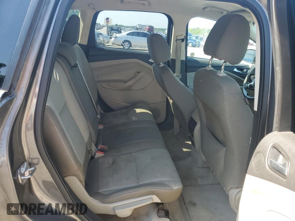 2014 Ford Escape SE z VIN 1FMCU9G91EUC77505, wystawiony jako Copart lot #52913005 z przebiegiem 119 299 mil mil oraz Szkoda całkowita • Salvage title. Historia ofert i sprzedaży dostępna na DreamBid. Obrazek 10.