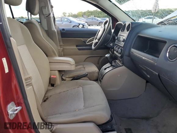 2011 Jeep Compass with VIN 1J4NT1FB4BD194839, listed as a Copart auction lot 73001014 with 113,050 mi miles and Salvage Title. Bid and sale history available at carsss.com. Image 7.