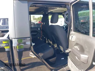 2021 Jeep Gladiator Willys with VIN 1C6HJTAGXML613431, listed as a IAAI auction lot 42180502 with 64,572 mi miles and . Bid and sale history available at DreamBid. Image 7.