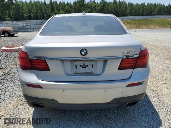 2013 BMW 7 Series 750i with VIN WBAYA8C58DC996865, listed as a Copart auction lot 61831294 with 151,238 mi miles and Salvage Title. Bid and sale history available at DreamBid. Image 6.