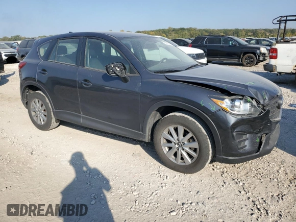 2016 Mazda CX-5 Sport with VIN JM3KE2BE7G0739544, listed as a Copart auction lot 75557244 with 128,336 mi miles and Salvage Title. Bid and sale history available at DreamBid. Image 4.