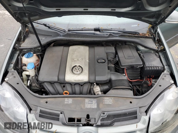 2008 Volkswagen Rabbit S с VIN WVWAB71KX8W133848, выставлен на аукционе Copart как лот 57830875 с пробегом 205 302 миль миль и Списание • Salvage title. История ставок и продаж доступна на DreamBid. Изображение 11.