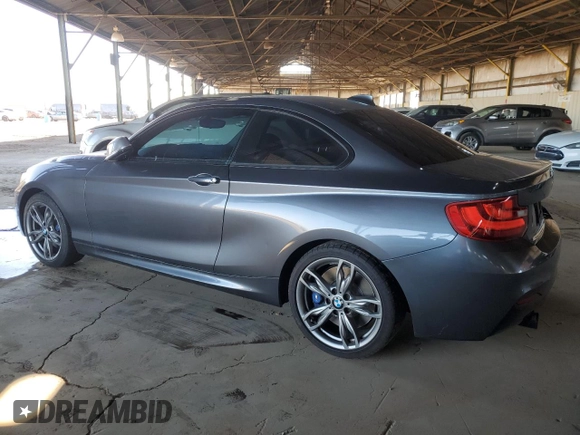 2015 BMW 2 Series M235i with VIN WBA1J7C59FV253506, listed as a Copart auction lot 49506005 with 73,628 mi miles and Clean Title. Bid and sale history available at carsss.com. Image 2.