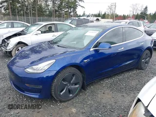2019 Tesla Model 3 Long Range with VIN 5YJ3E1EB8KF512950, listed as a IAAI auction lot 41836349 with 55,607 mi miles and . Bid and sale history available at DreamBid. Image 19.