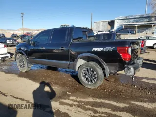 2017 Nissan Titan SV with VIN 1N6AA1E59HN509950, listed as a Copart auction lot 42231085 with 143,746 mi miles and Salvage Title. Bid and sale history available at DreamBid. Image 2.