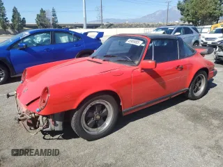 1984 Porsche 911 z VIN WP0EB0919ES161325, wystawiony jako Copart lot #45989085 z przebiegiem 130 483 mil mil oraz Szkoda całkowita • Salvage title. Historia ofert i sprzedaży dostępna na DreamBid. Obrazek 1.
