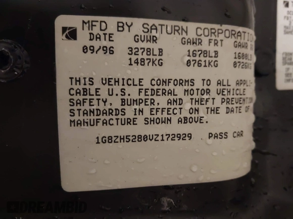 1997 Saturn SL with VIN 1G8ZH5280VZ172929, listed as a IAAI auction lot 41273214 with 134,972 mi miles. Bid and sale history available at carsss.com. Image 9.