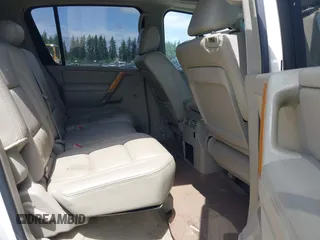 2005 Infiniti QX56 z VIN 5N3AA08C25N800604, wystawiony jako IAAI lot #42495962 z przebiegiem 266 669 mil mil oraz . Historia ofert i sprzedaży dostępna na DreamBid. Obrazek 8.