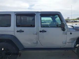 2015 Jeep Wrangler Unlimited Rubicon Hard Rock с VIN 1C4HJWFG6FL762537, выставлен на аукционе IAAI как лот 41792066 с пробегом 125 829 миль миль и . История ставок и продаж доступна на DreamBid. Изображение 13.
