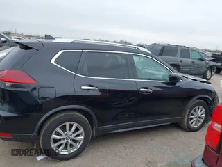 2018 Nissan Rogue S with VIN KNMAT2MTXJP615482, listed as a IAAI auction lot 41640340 with 103,940 mi miles and . Bid and sale history available at carsss.com. Image 14.