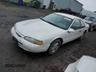 1997 Ford Thunderbird LX with VIN 1FALP62W2VH154138, listed as a Copart auction lot 46281235 with 145,738 mi miles and Clean Title. Bid and sale history available at DreamBid. Image 1.