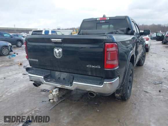 2019 Ram 1500 Laramie with VIN 1C6SRFDT6KN869740, listed as a IAAI auction lot 41563751 with 132,611 mi miles. Bid and sale history available at carsss.com. Image 4.