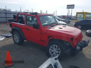 2023 Jeep Wrangler Willys z VIN 1C4HJXAG5PW659669, wystawiony jako IAAI lot #38834306 z przebiegiem 2 202 mil mil oraz . Historia ofert i sprzedaży dostępna na DreamBid. Obrazek 1.