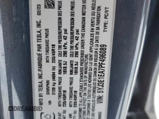 2023 Tesla Model 3 with VIN 5YJ3E1EA7PF496089, listed as a Copart auction lot 87101254 with 42,830 mi miles and Salvage Title. Bid and sale history available at DreamBid. Image 13.