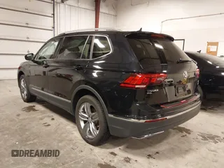 2021 Volkswagen Tiguan SE with VIN 3VV2B7AXXMM034880, listed as a IAAI auction lot 41979636 with 34,490 mi miles and . Bid and sale history available at DreamBid. Image 3.