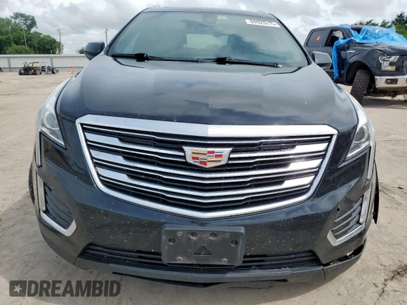 2017 Cadillac XT5 Luxury FWD with VIN 1GYKNBRS3HZ101867, listed as a Copart auction lot 60923215 with 130,209 mi miles and Salvage title. Bid and sale history available at DreamBid. Image 5.