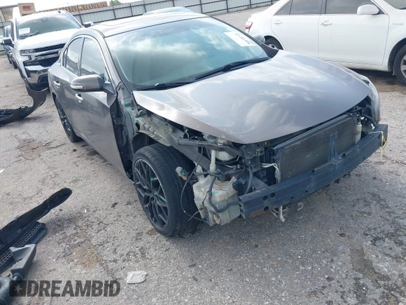 2014 Nissan Maxima SV with VIN 1N4AA5AP2EC447824, listed as a IAAI auction lot 42481206 with 157,540 mi miles and . Bid and sale history available at DreamBid. Image 1.