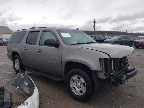 2009 Chevrolet Suburban LT w/2LT with VIN 1GNFC26J39R236980, listed as a IAAI auction lot 41721772 with 215,684 mi miles. Bid and sale history available at carsss.com. Image 1.