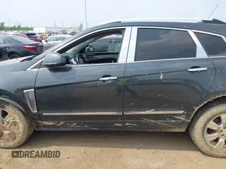 2016 Cadillac SRX Luxury Collection with VIN 3GYFNBE33GS553426, listed as a IAAI auction lot 42416200 with 118,256 mi miles and . Bid and sale history available at DreamBid. Image 14.