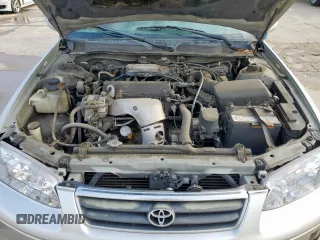2001 Toyota Camry CE z VIN 4T1BG22K01U085409, wystawiony jako Copart lot #55941765 z przebiegiem 215 062 mil mil oraz Szkoda całkowita • Salvage title. Historia ofert i sprzedaży dostępna na DreamBid. Obrazek 11.
