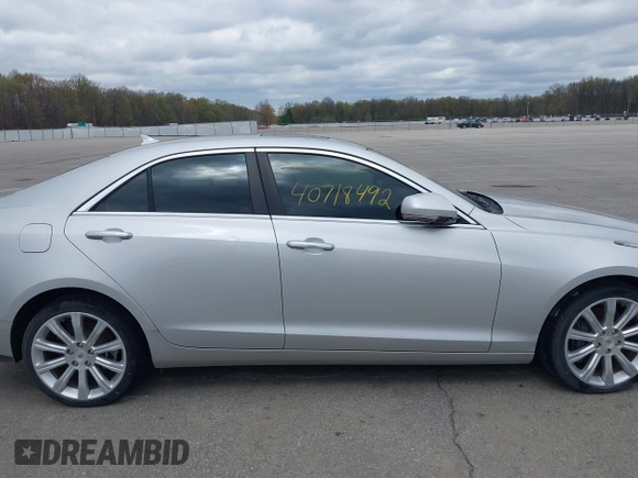 2014 Cadillac ATS Luxury AWD with VIN 1G6AH5SX9E0190881, listed as a IAAI auction lot 40718492 with 65,666 mi miles and . Bid and sale history available at carsss.com. Image 13.