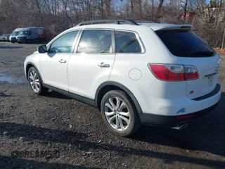 2011 Mazda CX-9 Grand Touring z VIN JM3TB3DV7B0313202, wystawiony jako IAAI lot #41213863 z przebiegiem 204 507 mil mil oraz . Historia ofert i sprzedaży dostępna na DreamBid. Obrazek 3.