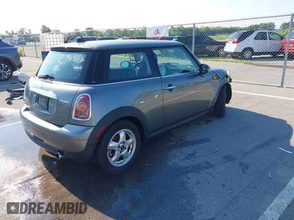 2010 MINI Hardtop with VIN WMWMF3C51ATZ61146, listed as a IAAI auction lot 42611461 with 96,038 mi miles and . Bid and sale history available at DreamBid. Image 4.