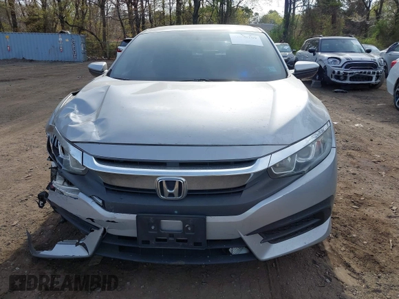 2018 Honda Civic Sedan LX with VIN 2HGFC2F5XJH573938, listed as a IAAI auction lot 42098109 with 69,037 mi miles. Bid and sale history available at carsss.com. Image 12.