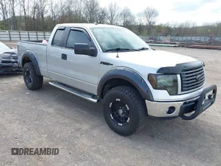 2011 Ford F-150 XL with VIN 1FTFX1ET0BFB75153, listed as a IAAI auction lot 41901358 with 142,573 mi miles. Bid and sale history available at carsss.com. Image 1.