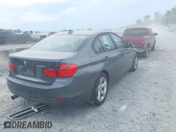 2013 BMW 3 Series 320i with VIN WBA3B1C54DF462873, listed as a IAAI auction lot 39931225 with 118,917 mi miles and . Bid and sale history available at DreamBid. Image 4.