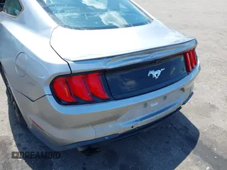 2020 Ford Mustang EcoBoost with VIN 1FA6P8TH0L5136647, listed as a IAAI auction lot 41998365 with 100,054 mi miles. Bid and sale history available at carsss.com. Image 6.