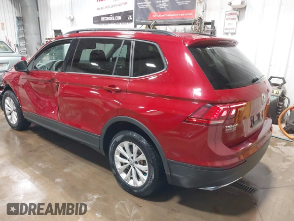 2018 Volkswagen Tiguan S with VIN 3VV0B7AX5JM104191, listed as a IAAI auction lot 42492503 with 96,339 mi miles and . Bid and sale history available at DreamBid. Image 3.