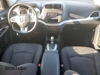 2013 Dodge Journey SXT with VIN 3C4PDCBG0DT522408, listed as a Copart auction lot 62699195 with 130,665 mi miles and Salvage title. Bid and sale history available at DreamBid. Image 8.