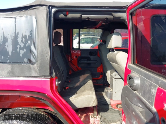 2007 Jeep Wrangler Unlimited X with VIN 1J4GB39197L150245, listed as a IAAI auction lot 41920390 with 239,532 mi miles and . Bid and sale history available at DreamBid. Image 8.