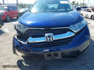 2018 Honda CR-V LX with VIN 2HKRW5H31JH400350, listed as a IAAI auction lot 41841871 with 74,231 mi miles. Bid and sale history available at carsss.com. Image 6.