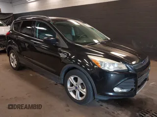 2014 Ford Escape SE with VIN 1FMCU0GX6EUE31877, listed as a IAAI auction lot 42080730 with 71,251 mi miles. Bid and sale history available at carsss.com. Image 1.