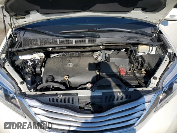 2017 Toyota Sienna XLE with VIN 5TDDZ3DC0HS164600, listed as a Copart auction lot 64262685 with 82,353 mi miles and Salvage title. Bid and sale history available at DreamBid. Image 12.