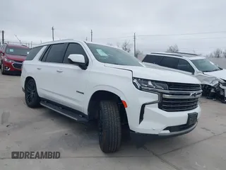 2021 Chevrolet Tahoe LT z VIN 1GNSKNKD8MR432263, wystawiony jako IAAI lot #41552577 z przebiegiem 53 369 mil mil oraz . Historia ofert i sprzedaży dostępna na DreamBid. Obrazek 1.