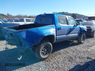 2018 Toyota Tacoma SR with VIN 3TMCZ5AN7JM128860, listed as a IAAI auction lot 41251397 with 97,246 mi miles. Bid and sale history available at carsss.com. Image 4.