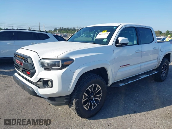 2018 Toyota Tacoma SR with VIN 5TFAX5GN2JX128621, listed as a IAAI auction lot 41797514 with 216,251 mi miles and . Bid and sale history available at DreamBid. Image 17.