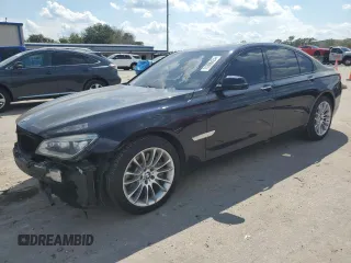 2014 BMW 7 Series 750i xDrive with VIN WBAYB6C53ED225212, listed as a Copart auction lot 71866424 with 122,567 mi miles and Salvage Title. Bid and sale history available at carsss.com. Image 1.