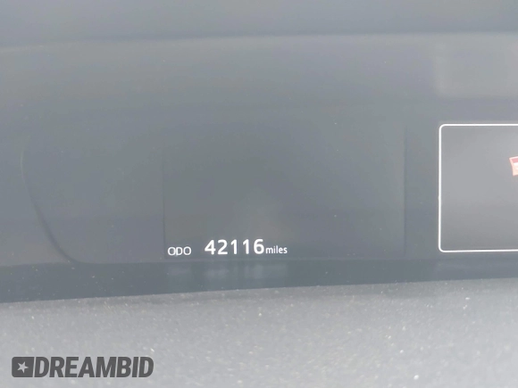 2021 Toyota Prius L Eco with VIN JTDKAMFU5M3132103, listed as a IAAI auction lot 42061511 with 42,116 mi miles and . Bid and sale history available at DreamBid. Image 7.