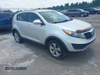 2012 Kia Sportage LX z VIN KNDPB3A25C7300865, wystawiony jako IAAI lot #42457904 z przebiegiem 156 863 mil mil oraz . Historia ofert i sprzedaży dostępna na DreamBid. Obrazek 1.