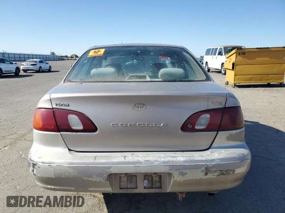 1998 Toyota Corolla VE with VIN 1NXBR12E3WZ093073, listed as a Copart auction lot 58270705 with 303,875 mi miles and Salvage title. Bid and sale history available at DreamBid. Image 6.